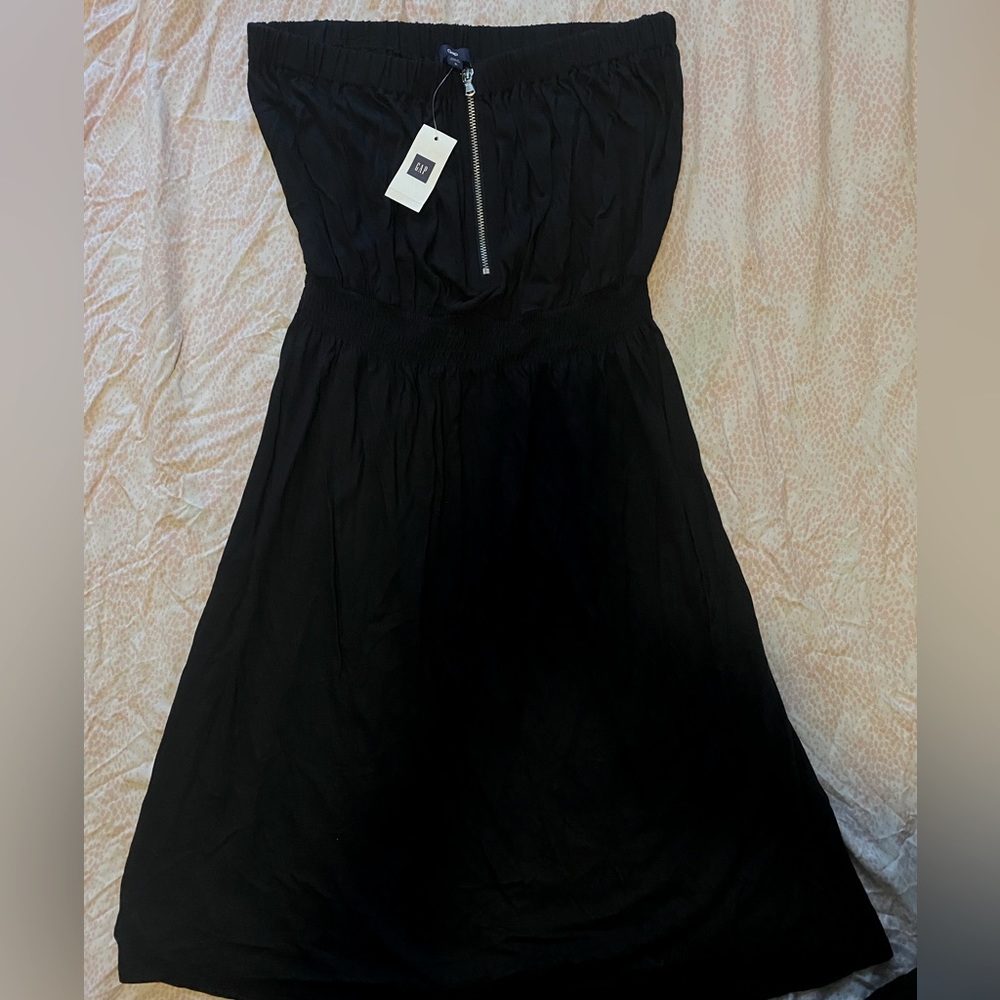 Small size black dress. Perfect for summertime nights and going out to the beach